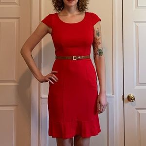 Red knit cap-sleeved dress with pleated hem, belt